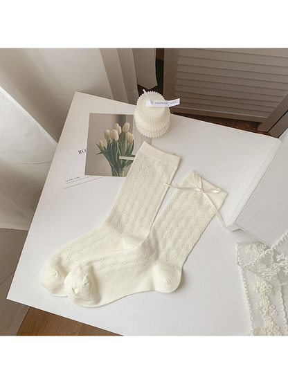 Ivory floral crew socks with a ribbon bow