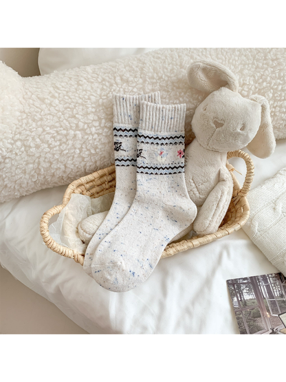 Ivory crew socks with floral and zigzag pattern bands