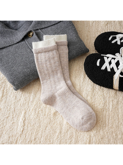 Beige ribbed crew socks with a contrasting cream cuff