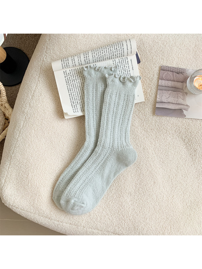 Light gray ribbed crew socks with ruffled cuffs