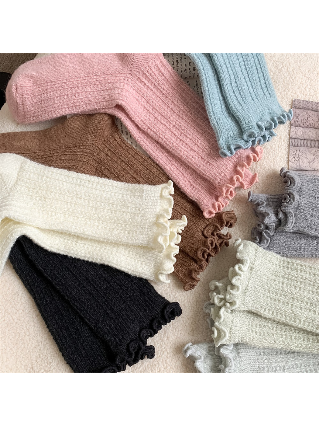 Close-up of ribbed textures and ruffled sock cuffs in assorted colors