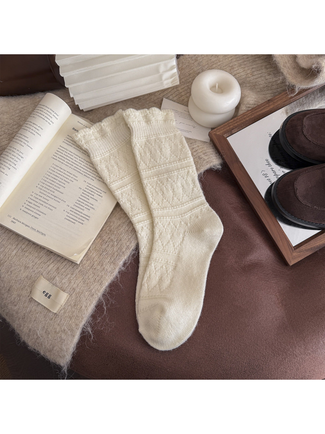 Ivory patterned crew socks laid flat