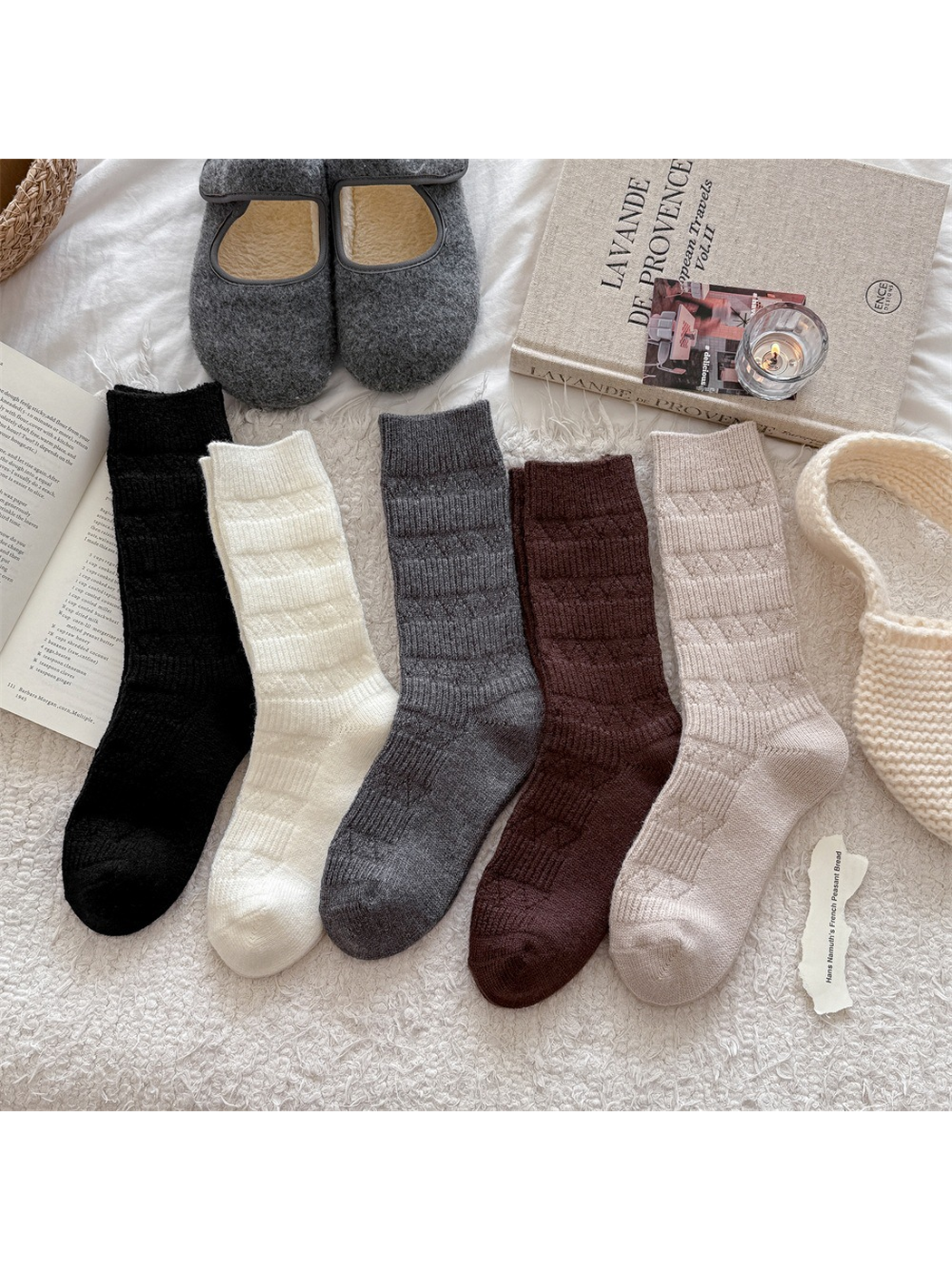 Black, ivory, dark gray, brown and beige crew socks arranged together