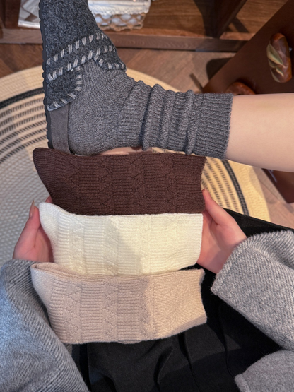 Dark gray sock worn with folded brown, ivory and beige color options