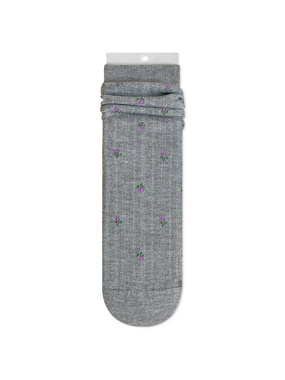 Gray crew sock with tiny floral motifs and a ribbed cuff