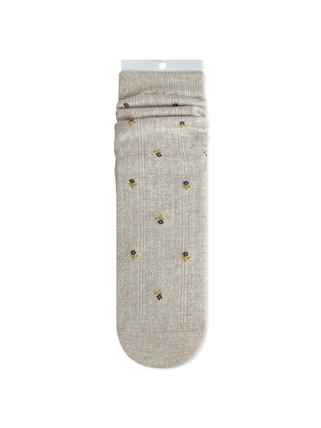 Beige crew sock with tiny dark floral motifs and a ribbed cuff