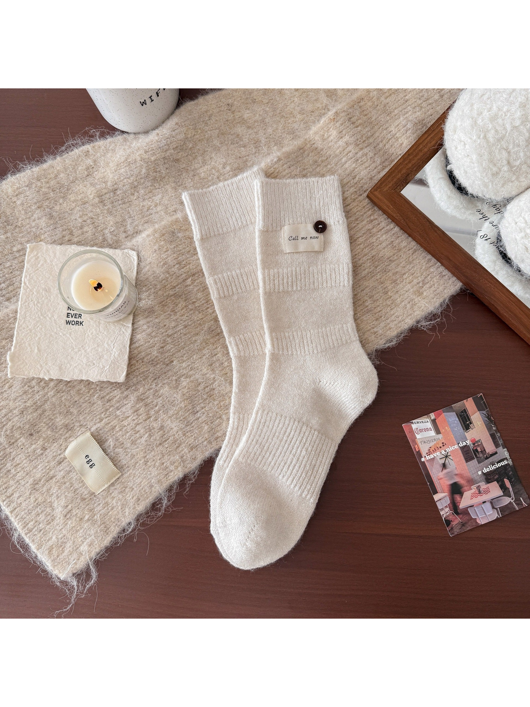 Ivory ribbed crew socks with fabric label and button detail