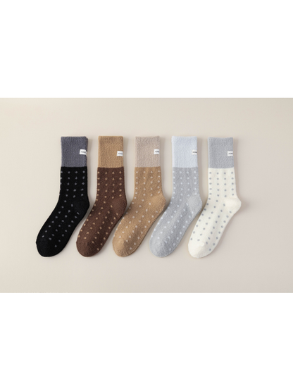 Five fuzzy polka-dot crew sock colors displayed side by side