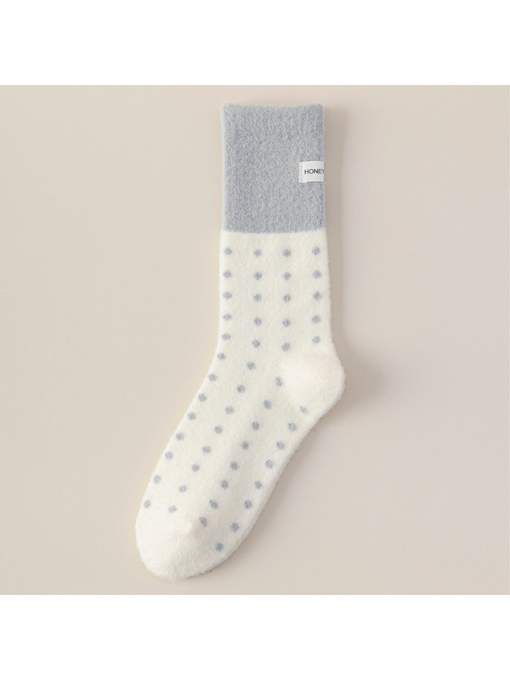 Ivory fuzzy crew sock with gray cuff and polka dots