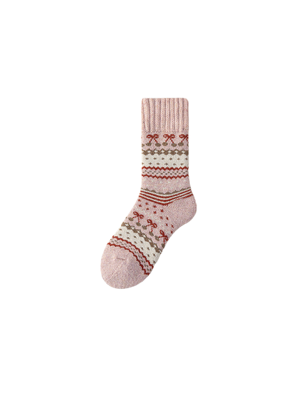 Pink crew sock with geometric bands and a ribbed cuff