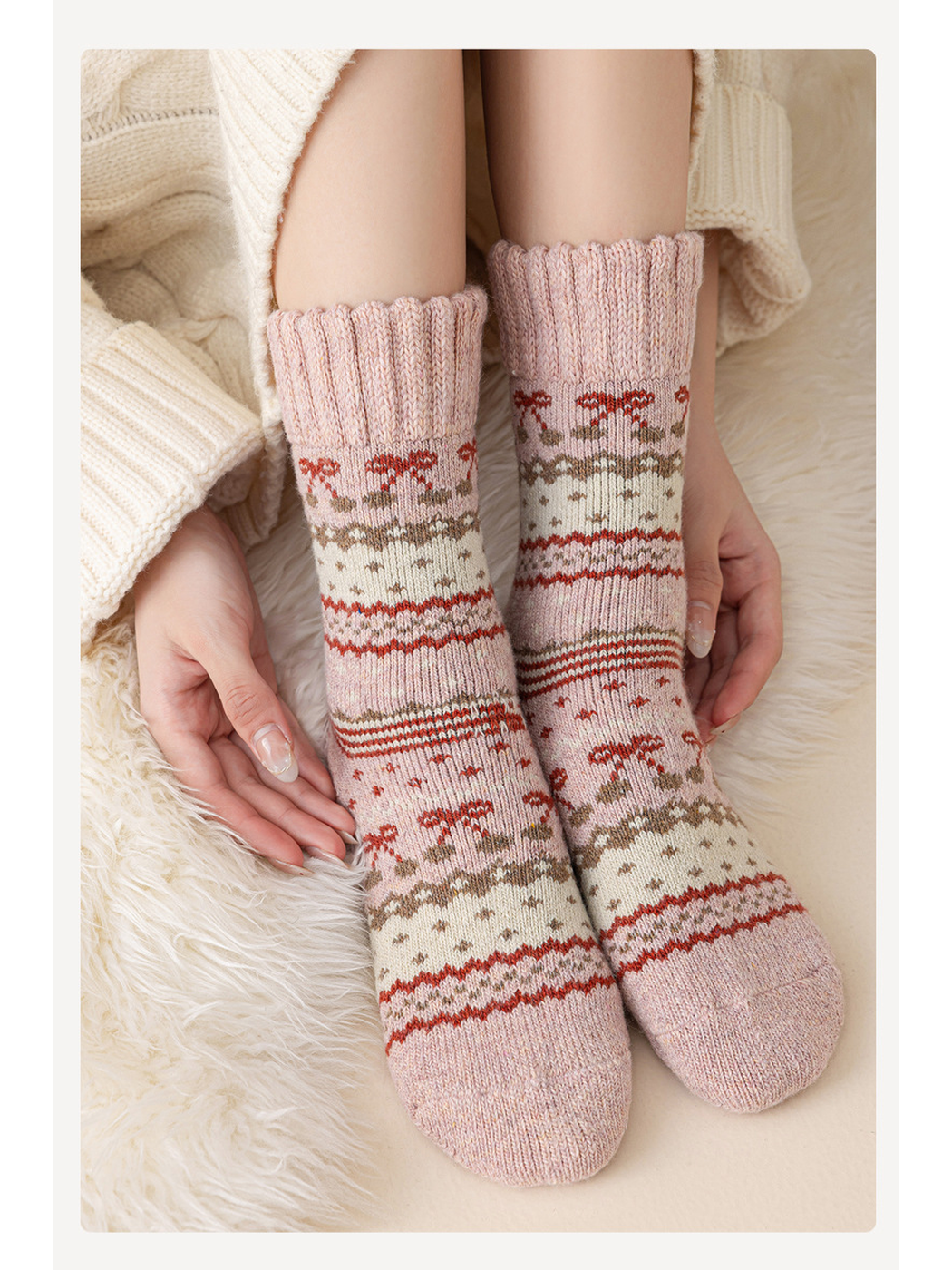 Pink patterned crew socks worn in a seated close-up