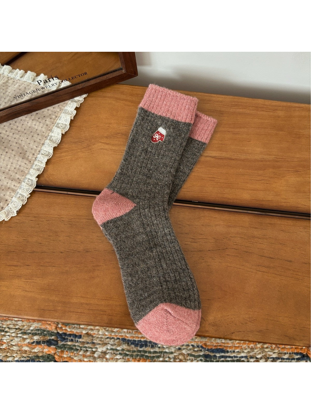 Brown ribbed crew socks with pink trim and mitten embroidery