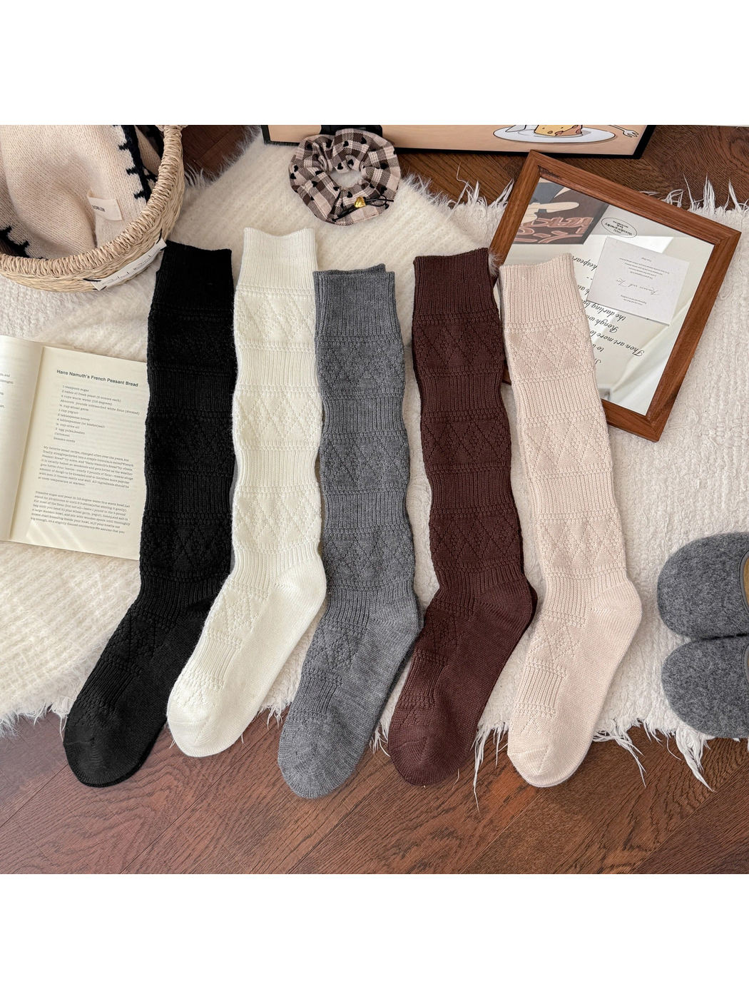 Knee-high textured socks displayed in five neutral colors