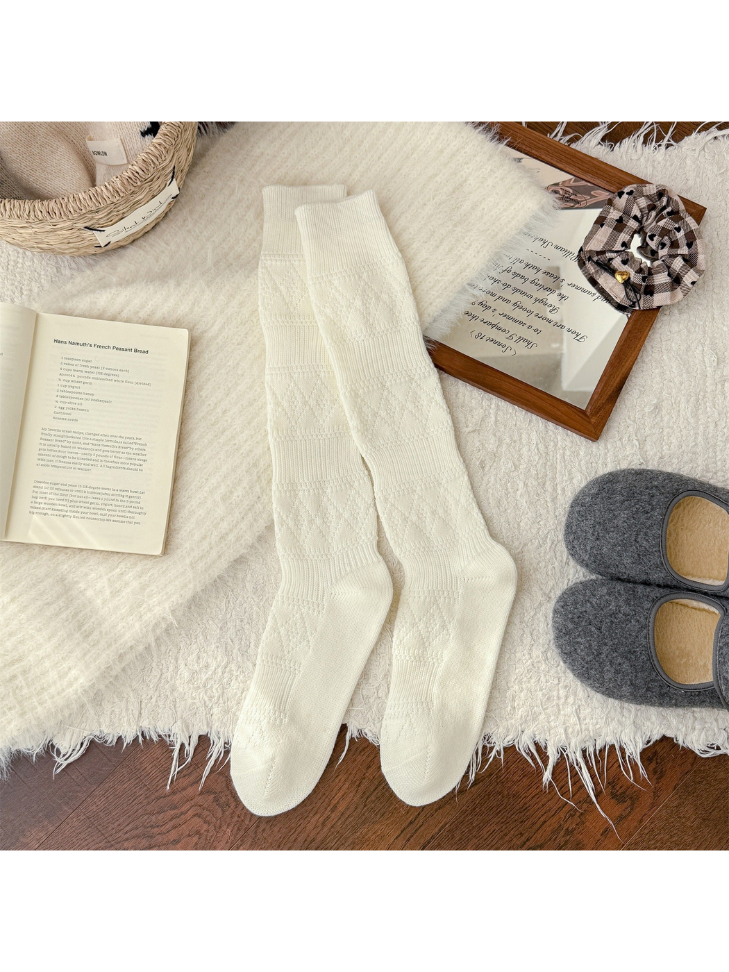 Ivory knee-high textured socks laid flat