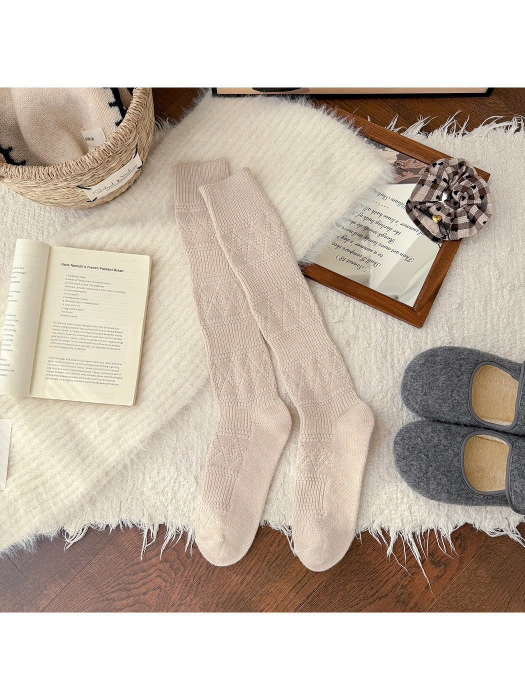 Beige knee-high textured socks laid flat