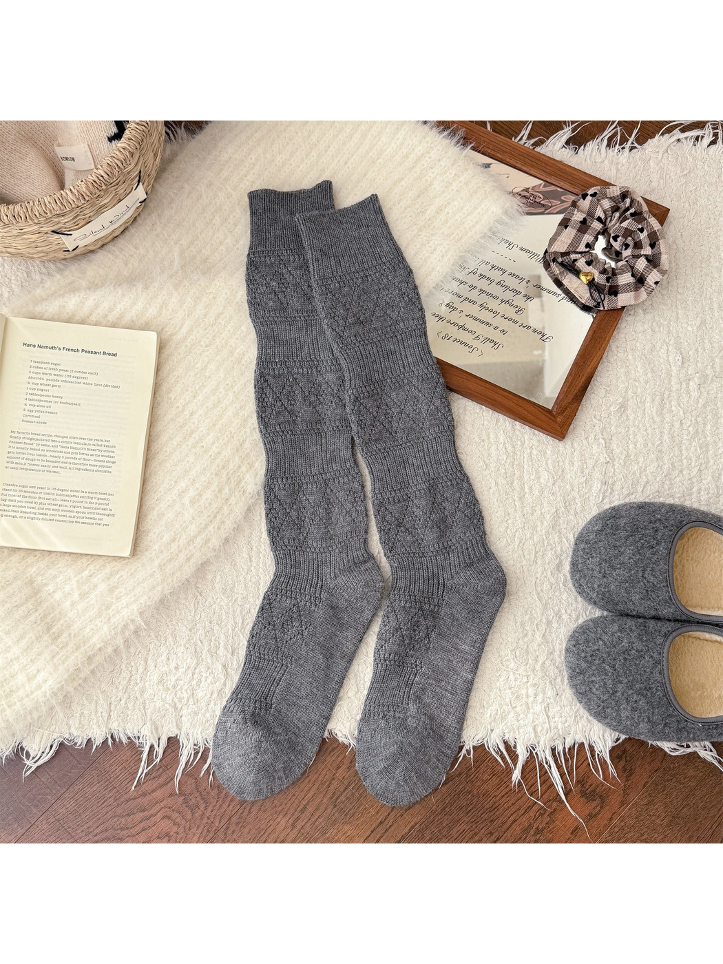 Dark gray knee-high textured socks laid flat