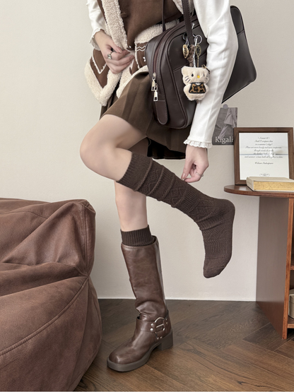 Brown knee-high textured sock styled with a tall boot