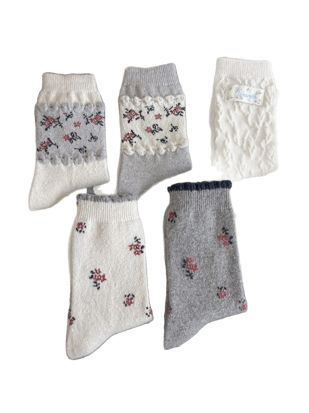 Five ivory and gray floral crew sock styles on a white background