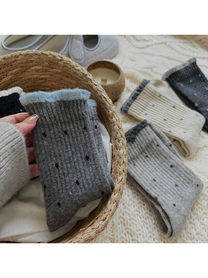 Close-up of the ribbed texture and contrasting ruffled cuffs