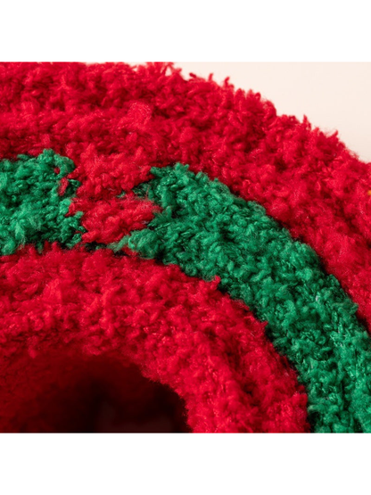 Close-up of the fuzzy red and green looped texture