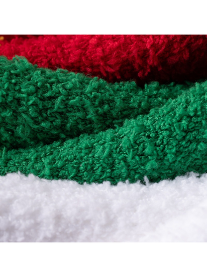 Close-up of the fuzzy green, red and white sock surfaces