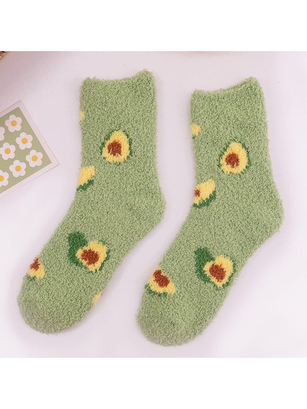 Sage green fuzzy avocado crew socks, full pair