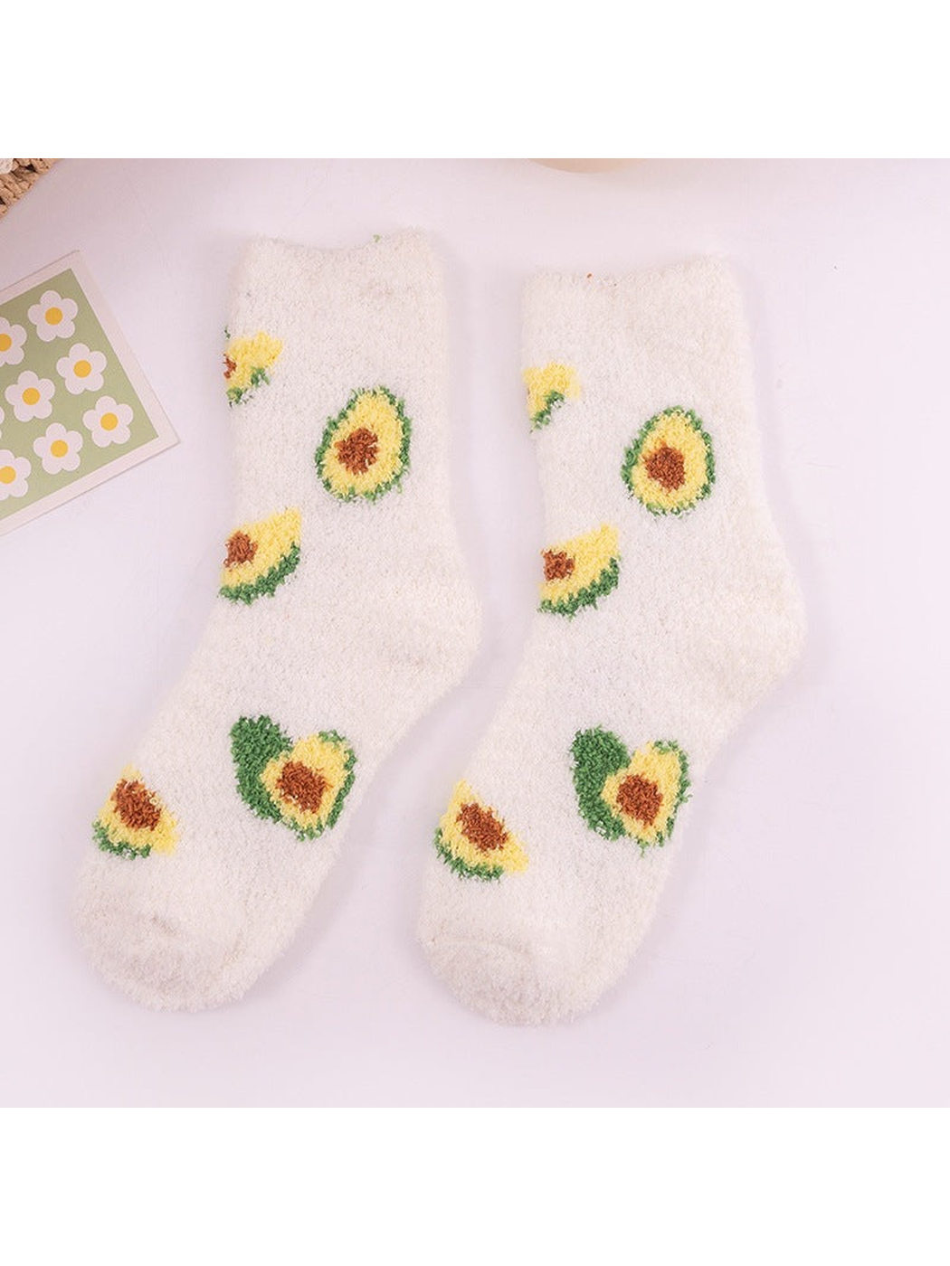 White fuzzy avocado crew socks, full pair