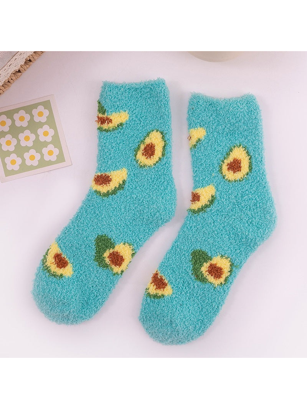Turquoise fuzzy avocado crew socks, full pair