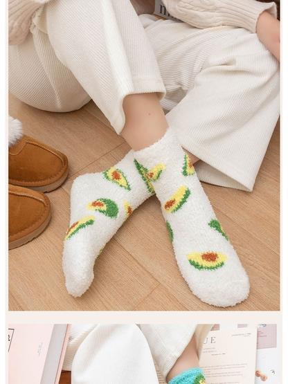 White fuzzy avocado crew socks worn with crossed ankles