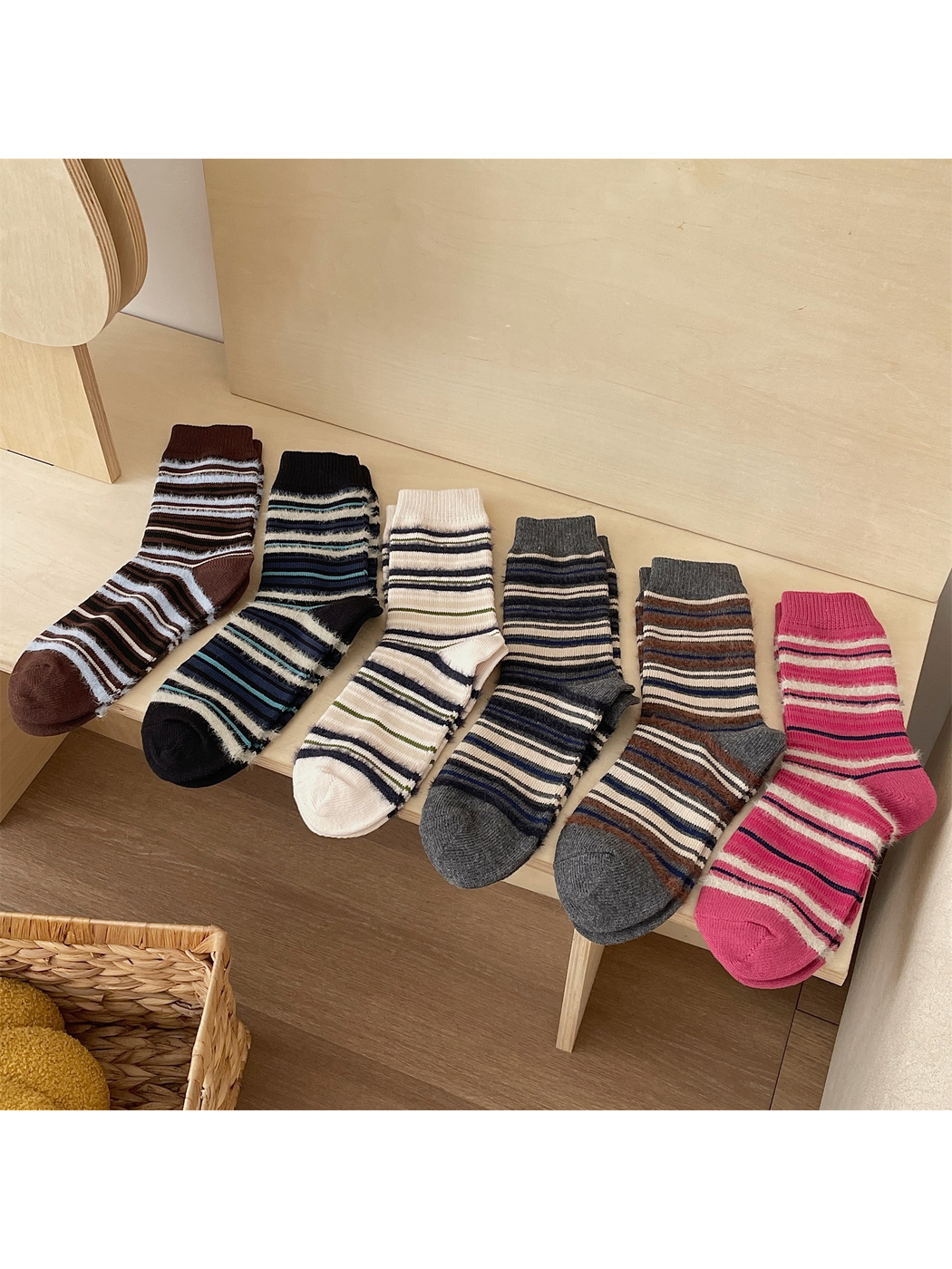 Six striped crew sock color styles arranged together