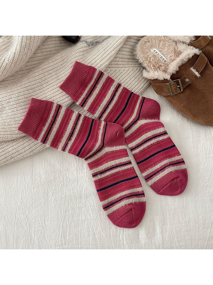 Pink crew socks with cream and navy stripes