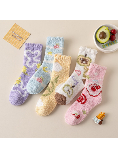Five colorful fuzzy crew sock styles arranged together