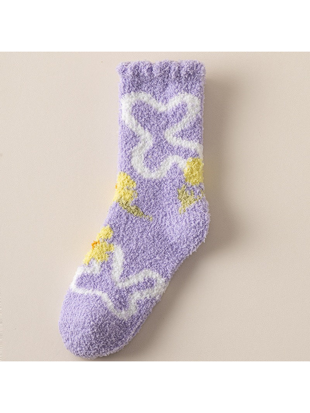 Light purple fuzzy crew sock with white looping flowers and yellow accents