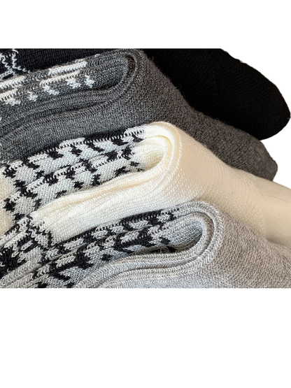 Close-up of folded crew socks with ribbed knit texture and geometric bands
