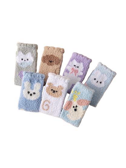 Assorted fuzzy crew socks with animal motifs arranged together