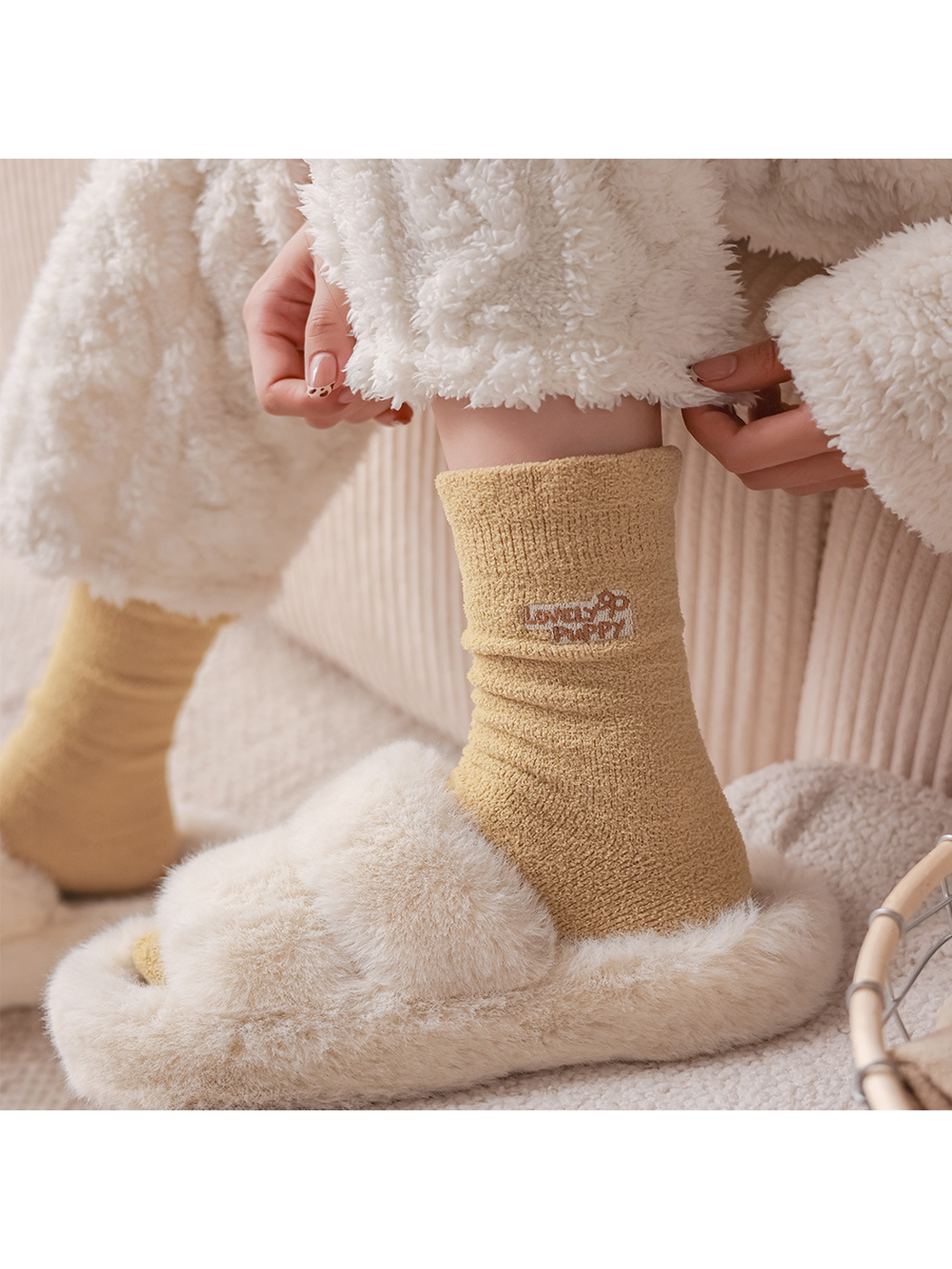 Mustard yellow fuzzy crew socks worn with plush slippers