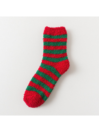 Fuzzy sock with alternating red and green stripes
