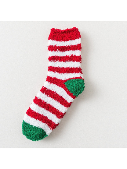 Fuzzy sock with red and white stripes and green toe and heel