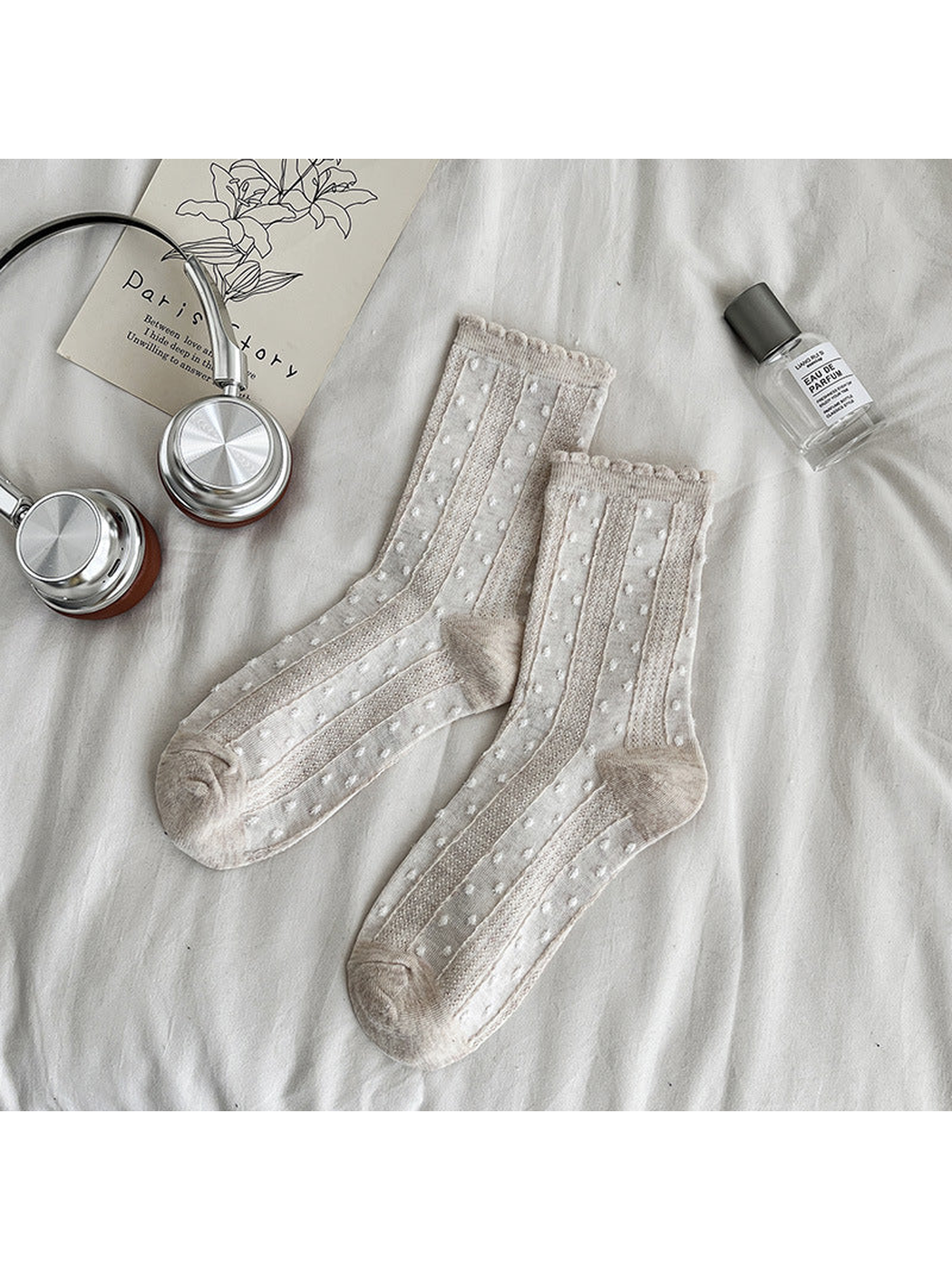 Beige dotted crew socks with textured vertical panels