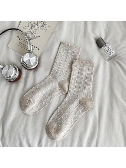 Beige dotted crew socks with textured vertical panels