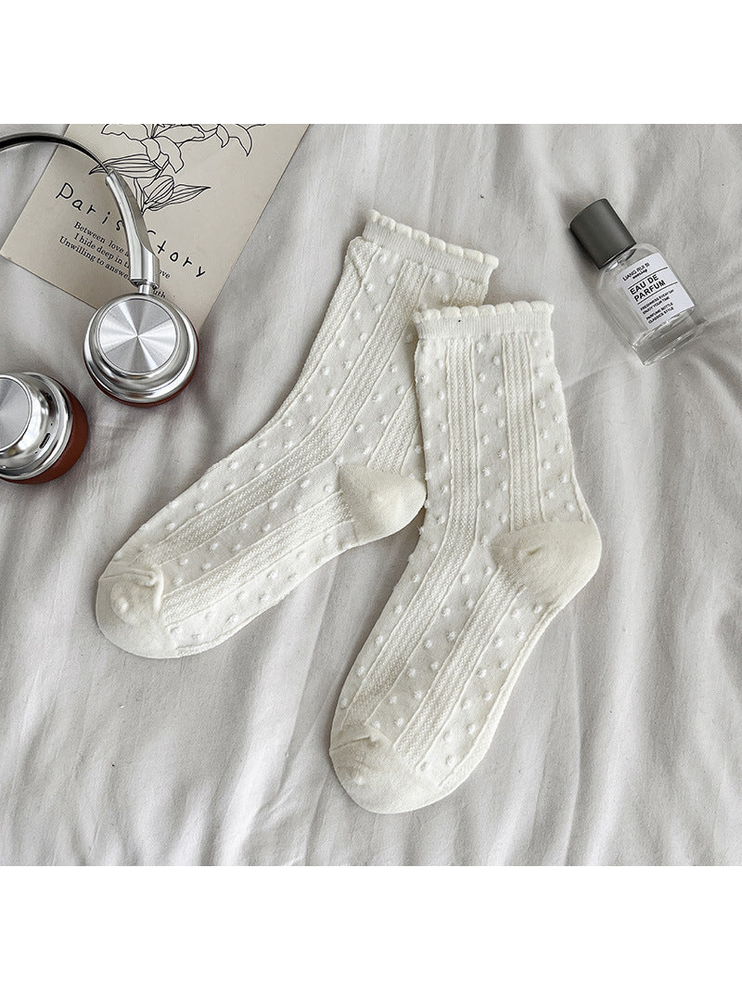Ivory dotted crew socks with textured vertical panels