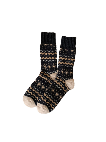 Black geometric crew socks with contrasting beige heels and toes
