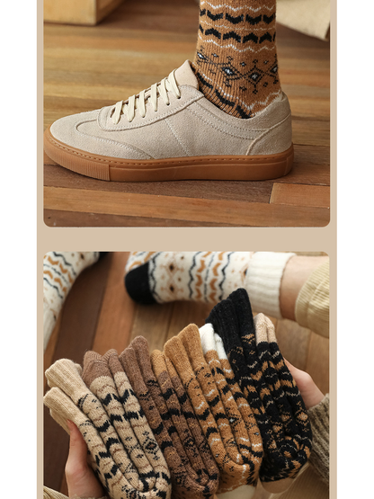 Camel geometric crew socks styled with sneakers beside assorted colors
