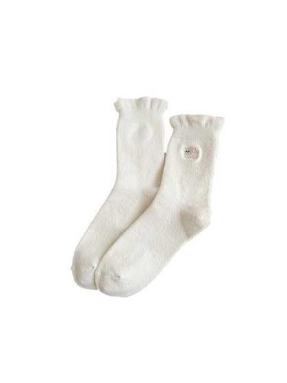 Ivory crew socks with white dog embroidery and ruffled cuffs