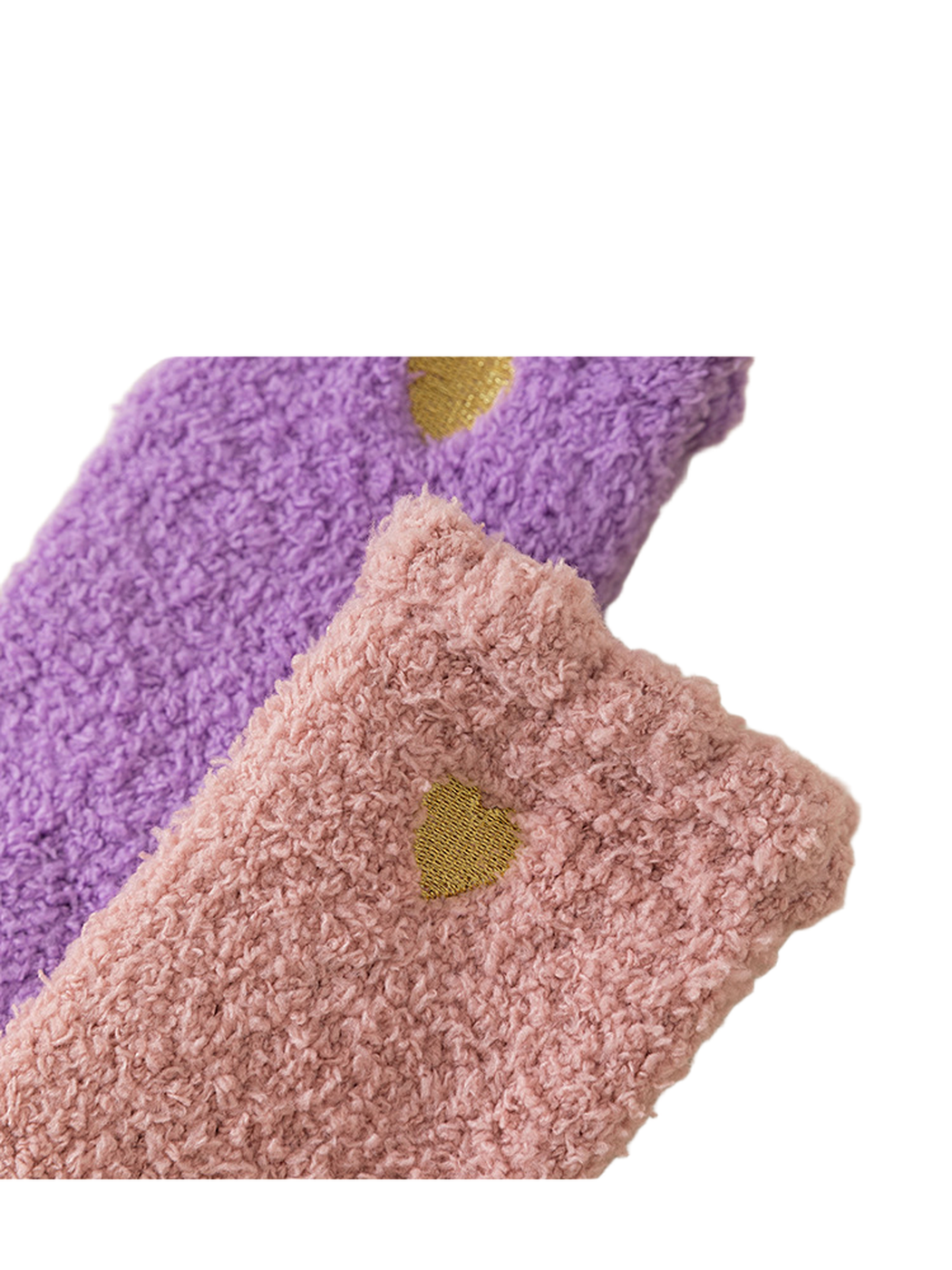 Close-up of gold heart stitching on pink and purple fuzzy socks