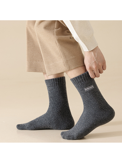 Dark gray crew socks worn while standing