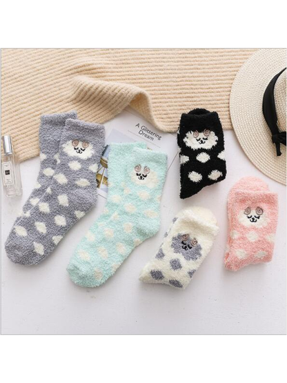 Five colors of fuzzy polka-dot crew socks arranged together