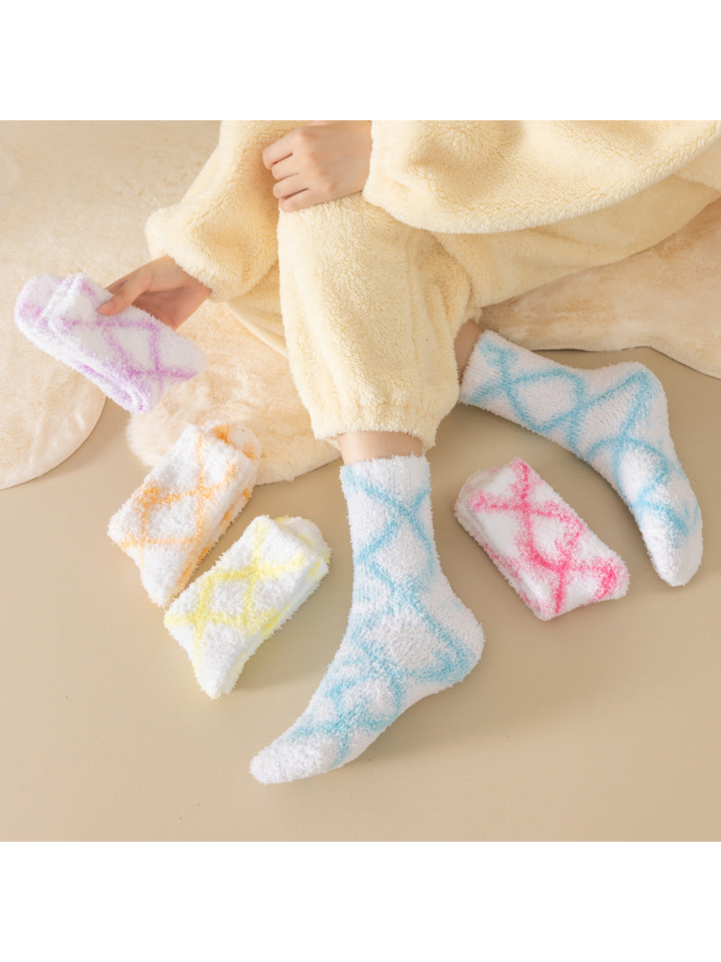 Fuzzy diamond-pattern crew socks worn with additional color options arranged nearby