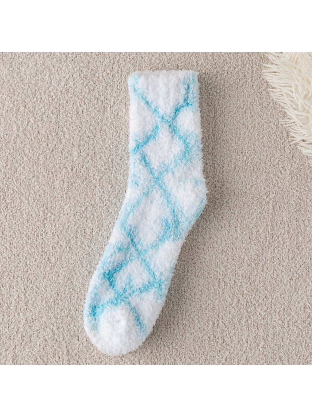 Light blue diamond-pattern fuzzy white crew sock, full view