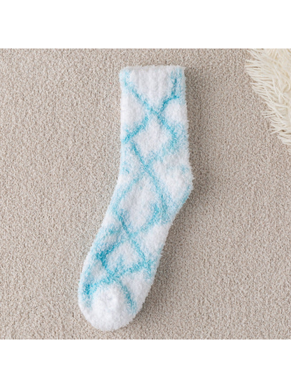 Light blue diamond-pattern fuzzy white crew sock, full view
